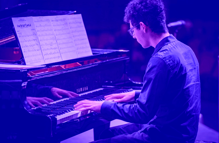 Noam Sky Levy playing piano